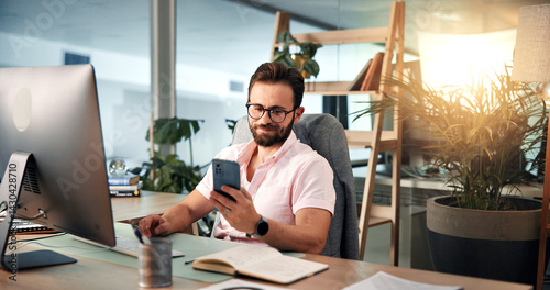 Obraz na płótnie Computer, planning and phone with business man at desk for investment or portfolio management. Agenda, communication and finance with happy stock market broker in workplace for strategy development w salonie