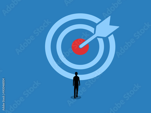 Goal Achievement, Businessman walking towards a large target