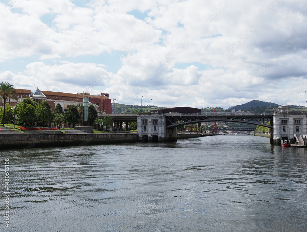 Obraz premium Steel old bridge at Nervion river in European Bilbao city in Spain