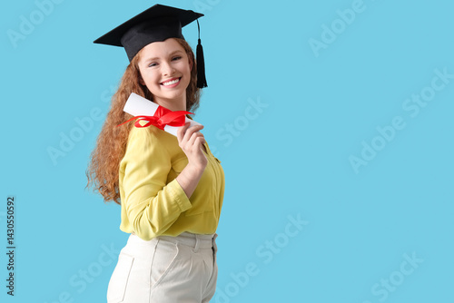 Happy female student in gra...