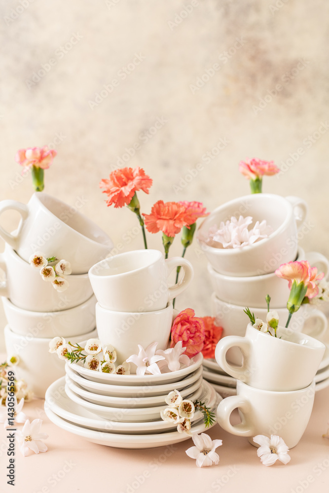 Elegantly arranged spring tableware with floral accents Elegantly arranged spring tableware with floral accents