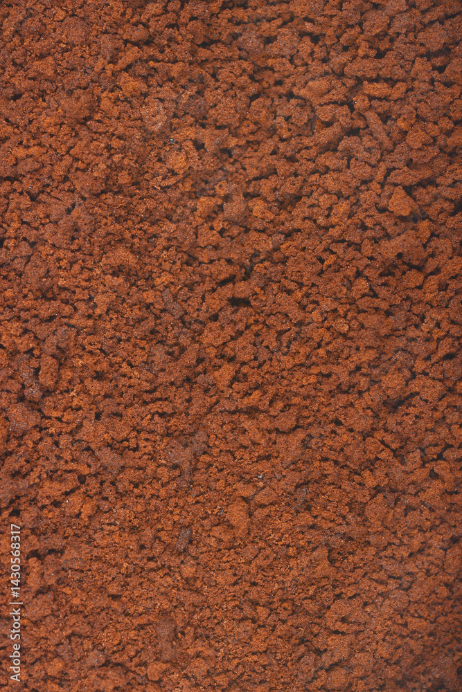 A textured close-up shows a pile of dark brown instant coffee granules
