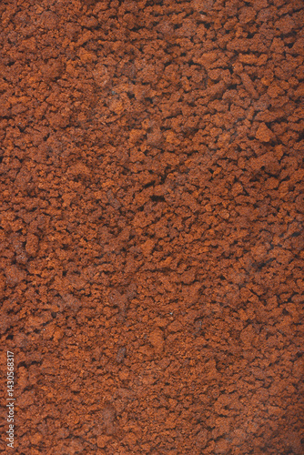Obraz na płótnie A textured close-up shows a pile of dark brown instant coffee granules w salonie