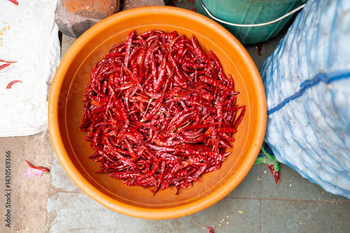 Fototapeta Naklejka Na Ścianę i Meble -  Red chilli pepper spices for sale on a spice market in Mumbai, India, fresh ingredients for cooking indian food
