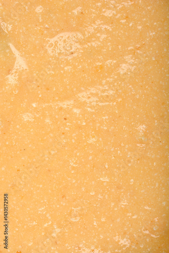 Obraz na płótnie A textured, pale yellow mixture of eggs and semolina is shown in a detailed close-up, ready to be formed into dumplings for soup w salonie