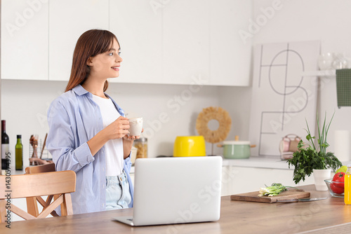 Young woman with cup of cof...