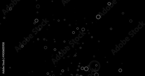 Abstract animation of chaotic falling bubbles and spheres on dark seamless background