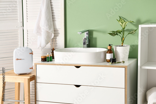 Sink, small refrigerator an...
