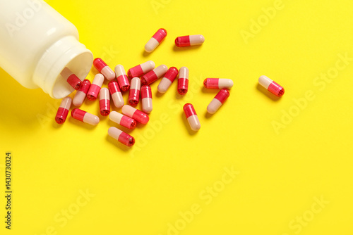 Jar with pink hard capsules...