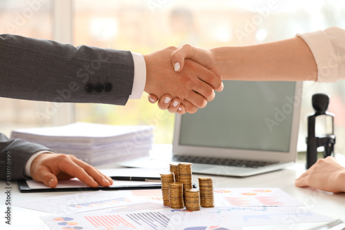 Business partners shaking h...