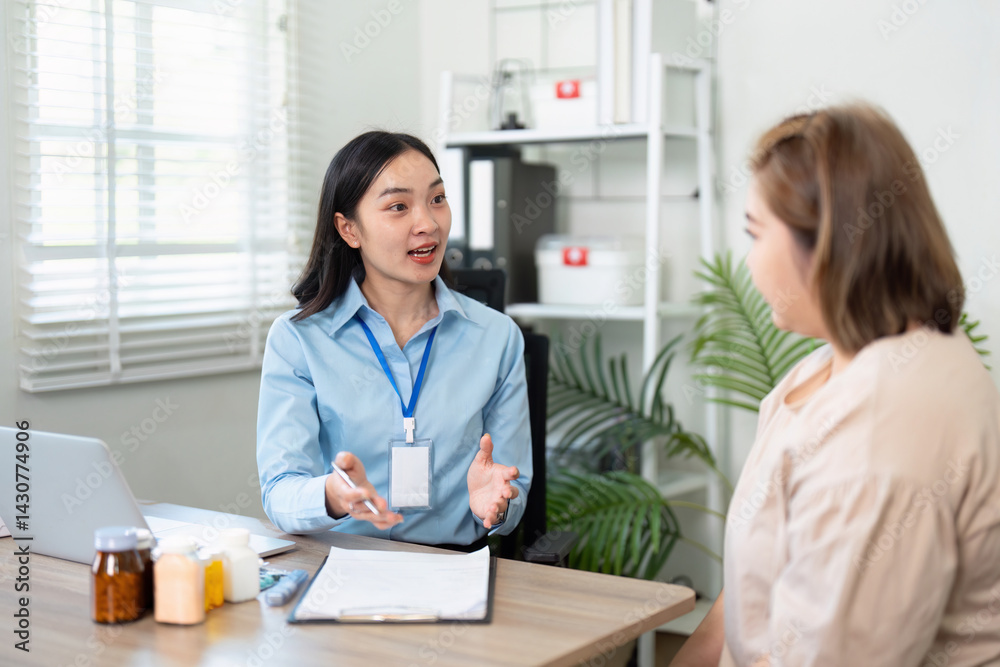 Consultation and Patient Interaction. A general practitioner explaining health information to a patient during a visit. Consultation and Patient Interaction. A general practitioner explaining health information to a patient during a visit.