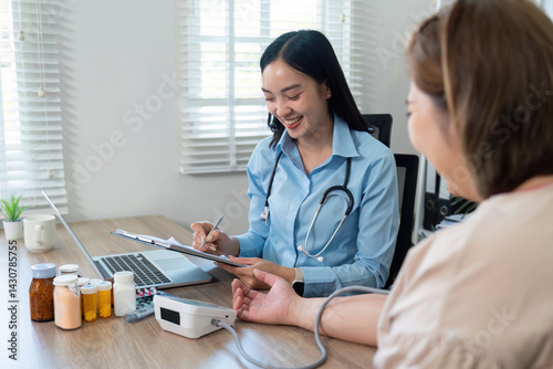 Consultation and Health Assessment. A general practitioner discussing health with a patient during a medical visit.