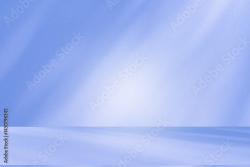 Wall interior background, studio and backdrops show products. with soft light shadow from window color blue and white. background for text insertion and presentation of product	
