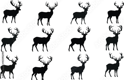 A collection of black silhouette deer standing in a row with antlers raised on an open field, illustrating wildlife in natural harmony.	