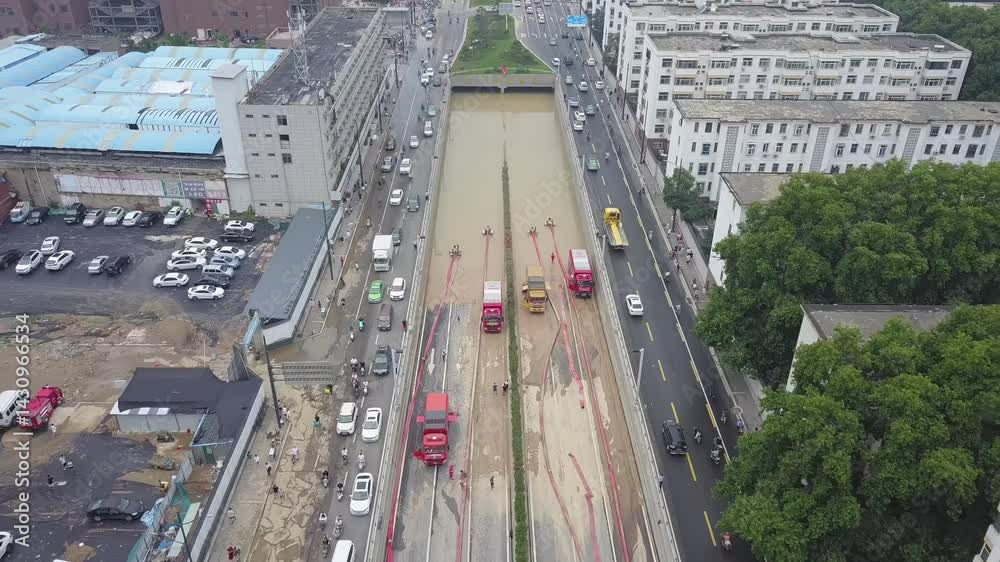 Tunnel culvert drainage operations in Zhengzhou, Henan Province during heavy rain events