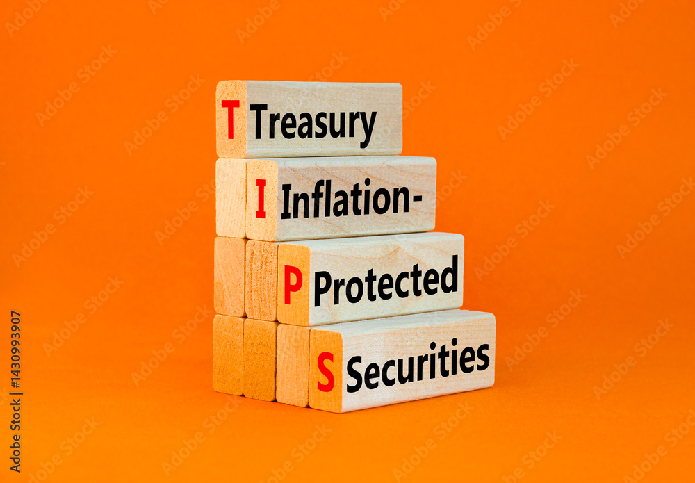 Naklejka premium TIPS symbol. Concept word TIPS Treasury Inflation Protected Securities on beautiful blocks. Beautiful orange background. Business TIPS Treasury Inflation Protected Securities concept. Copy space.
