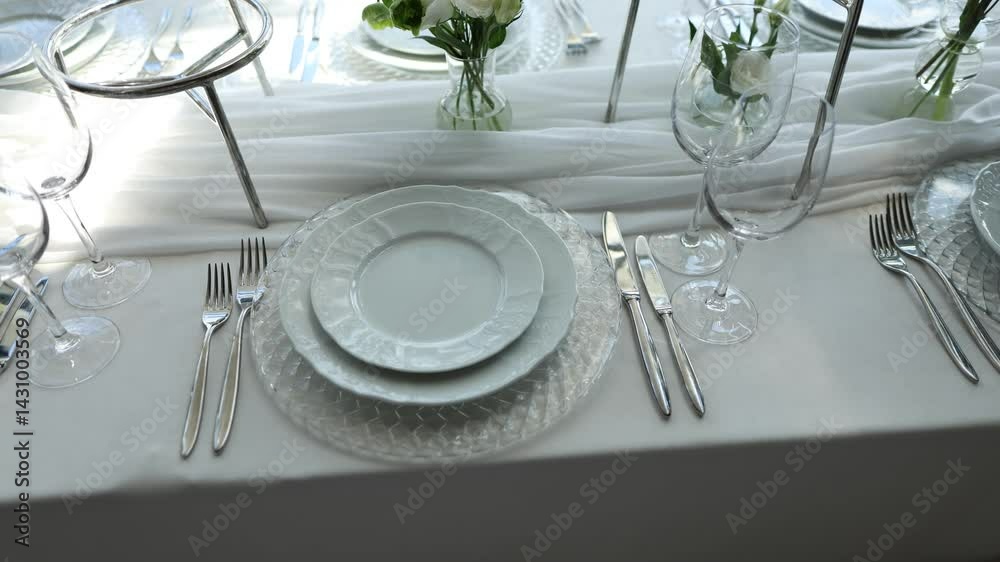 table setting in a restaurant with a plate, fork, and knife