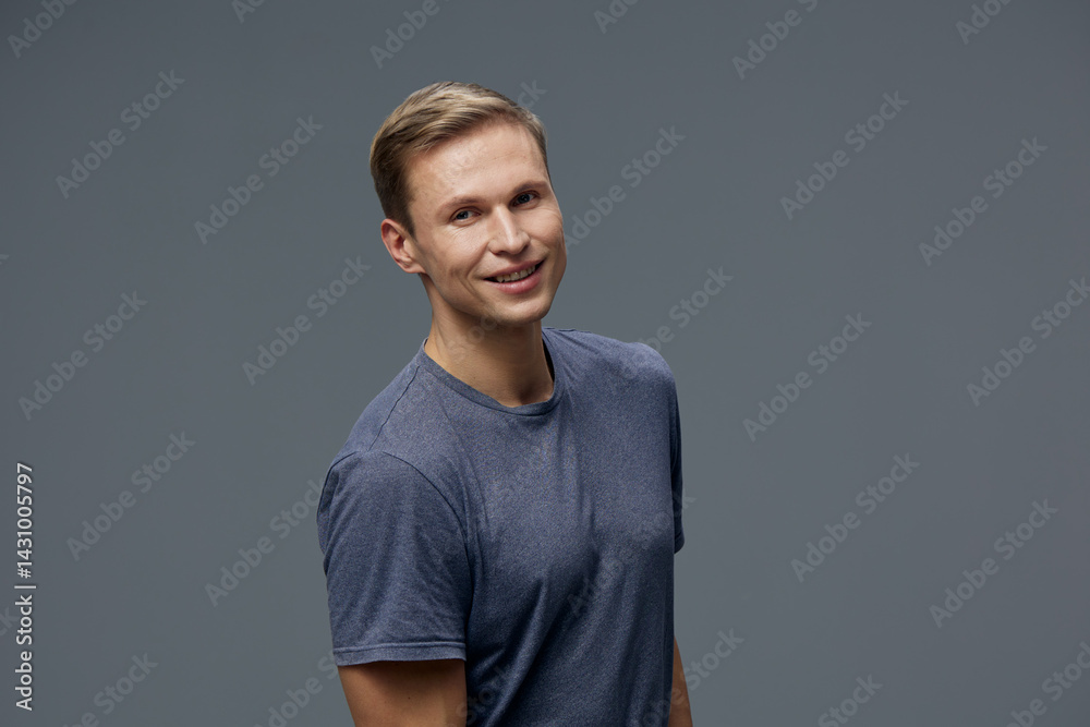 Smiling man casual wear look camera short haircut standing dark gray background digital nomad lifestyle concept Smiling man casual wear look camera short haircut standing dark gray background digital nomad lifestyle concept