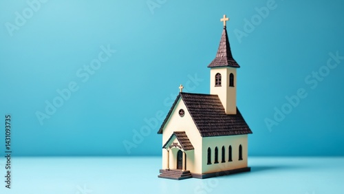 Viewing Miniature Church Model on Blue Background
