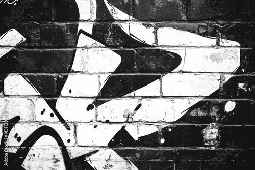 Obraz na płótnie Bold Black and White Graffiti Illustration on Urban Brick Wall Showcases Street Art Culture and Creative Expression Generative AI w salonie