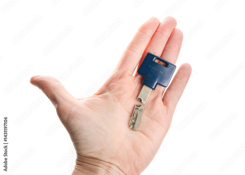 Broken key held by hand. Key snapped in two pieces. House key for residential building. Locksmith or handyman needed for lock malfunction or key replacement. Selective focus. White background. Broken key held by hand. Key snapped in two pieces. House key for residential building. Locksmith or handyman needed for lock malfunction or key replacement. Selective focus. White background.