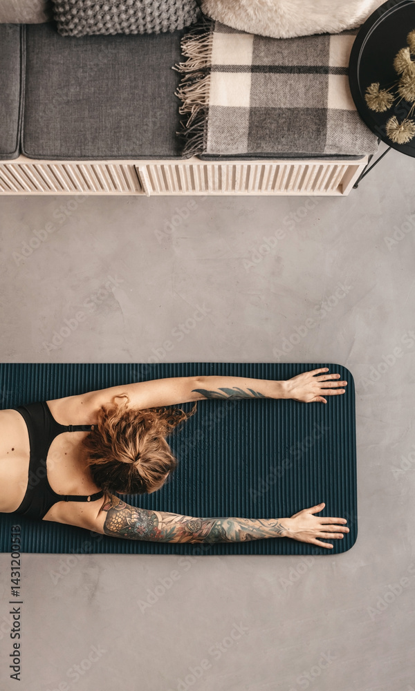 Woman Practicing Yoga and Doing Stretching Exercises