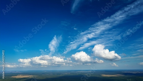 blue sky with clouds over the horizon