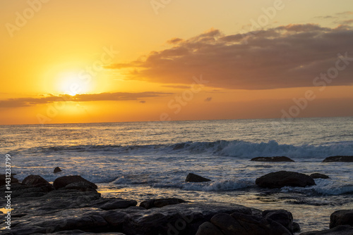 Carta da parati Sun rising on the South Coast of South Africa in Uvongu, Margate