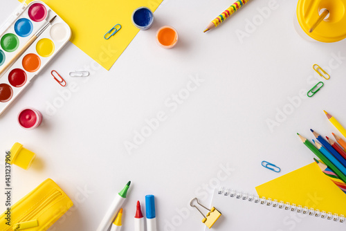 Foto Artistic flat-lay of various vibrant school supplies including crayons, paint, a