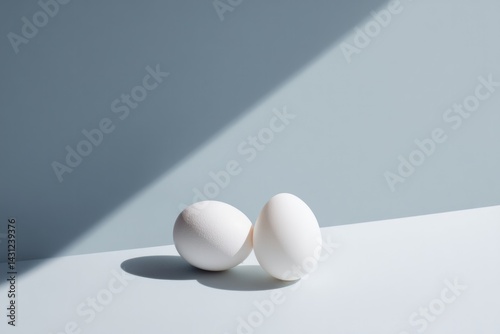 juxtaposed elements in close-up showcase stark contrasts against minimalistic backdrop with ample copy space photo