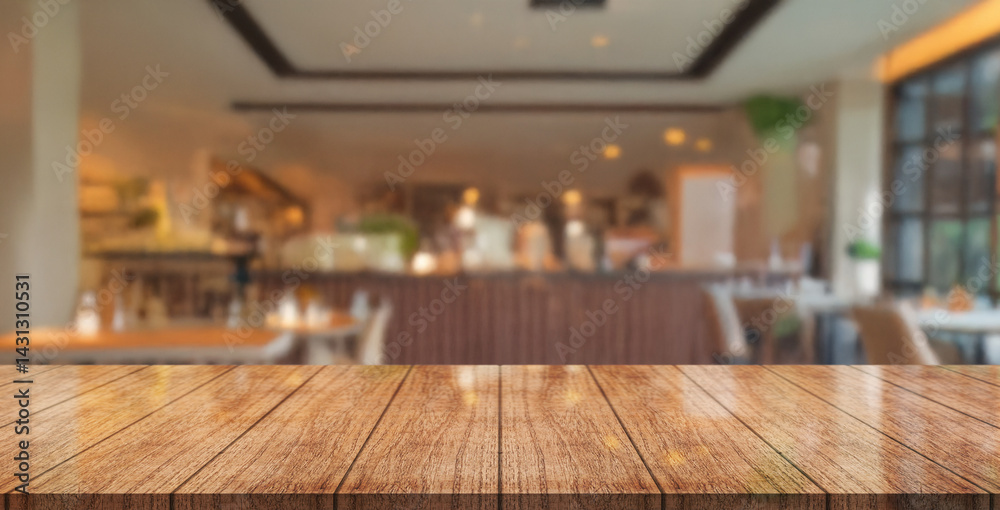 Empty wooden table top with lights bokeh on blur restaurant background. Empty wooden table top with lights bokeh on blur restaurant background.