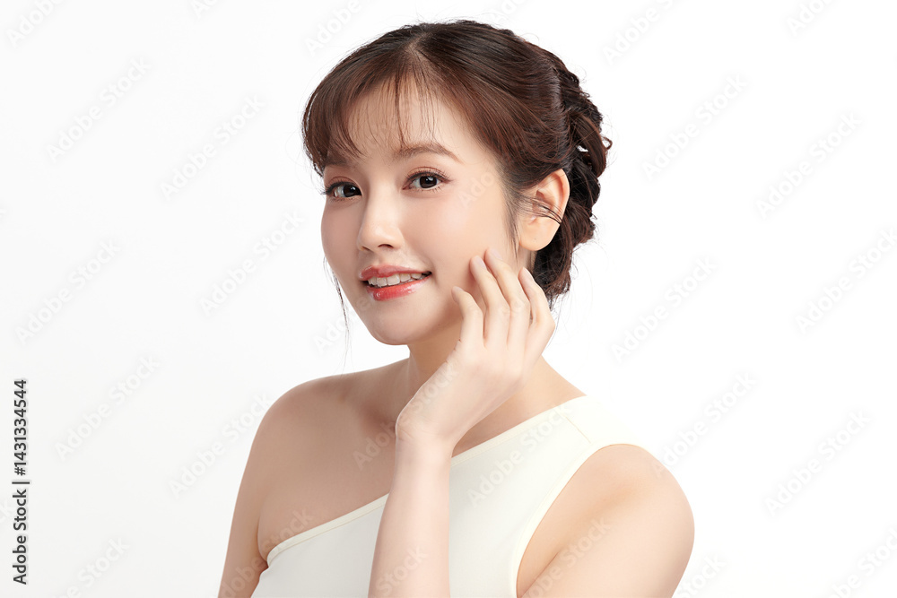 A beautiful young Asian woman with clean, fresh skin against a white background. Skincare, facial treatment, cosmetology, beauty, and spa. An elegant portrait of an Asian woman. A beautiful young Asian woman with clean, fresh skin against a white background. Skincare, facial treatment, cosmetology, beauty, and spa. An elegant portrait of an Asian woman.