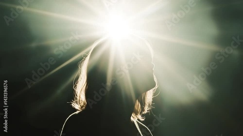 Shining Light on Inner Self: A captivating silhouette of a person emerges against the bright sun, representing the brilliance of insight, knowledge, and spiritual awakening.