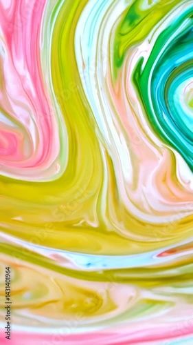 Vibrant abstract marble texture with swirling patterns of pink, green, yellow, and turquoise colors. The liquid-like movement creates flowing waves that gradually transform and blend together.