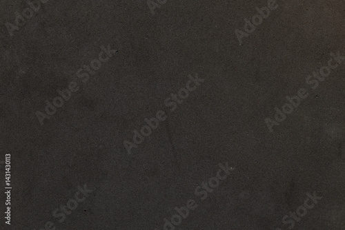 Black porous soft texture rug, top view, background