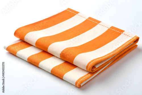 A closeup of an isolated orange towel, a colorful textile object on white.