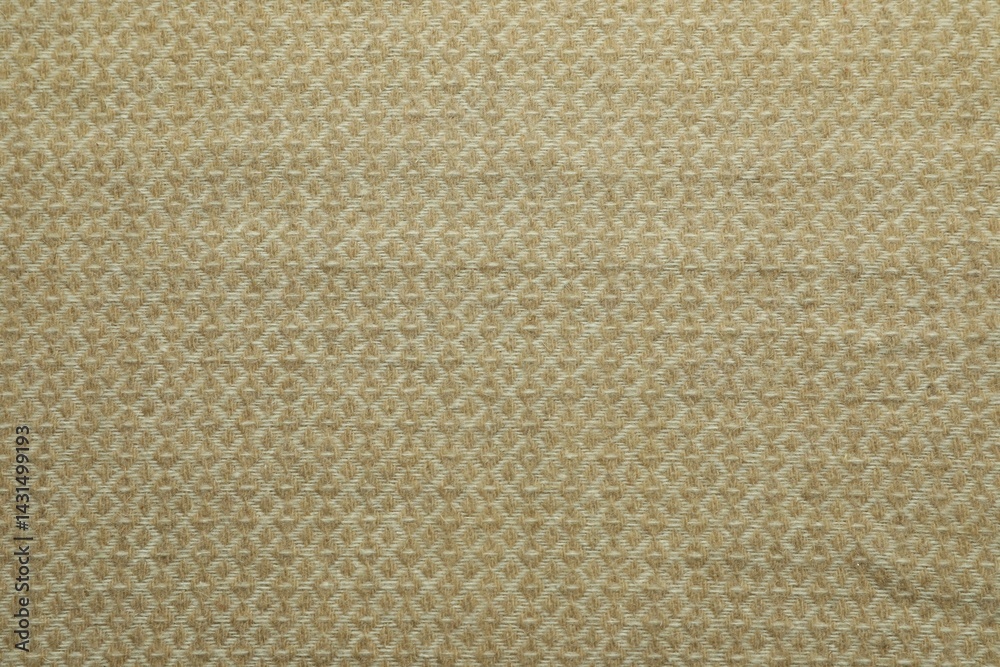 Fototapeta premium Beige woolen fabric with geometrical pattern as background, top view