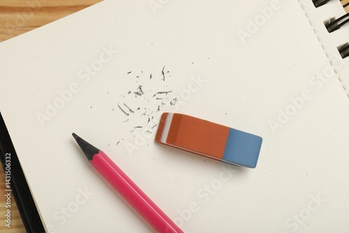 Obraz na płótnie Eraser, pencil, scraps and notebook on table, top view w salonie