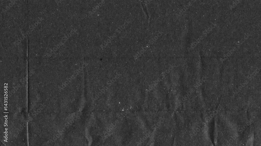 Black kraft paper noise texture 4K stop motion video. Aged old page overlay effect background loop animation. Vintage paper texture with crease, stain, grain, dust particles. Empty animated backdrop