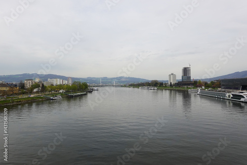 Obraz na płótnie A riverside embankment in Linz, the river Danube, Austria w salonie