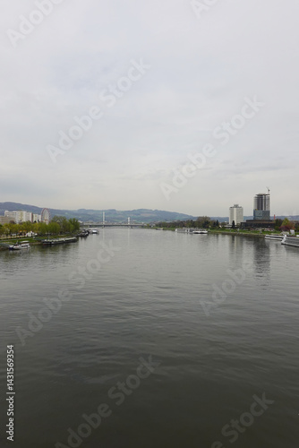 Obraz na płótnie A riverside embankment in Linz, the river Danube, Austria w salonie