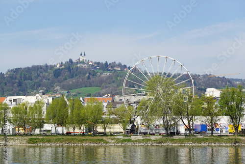 Obraz na płótnie A riverside embankment in Linz, the river Danube, Austria w salonie