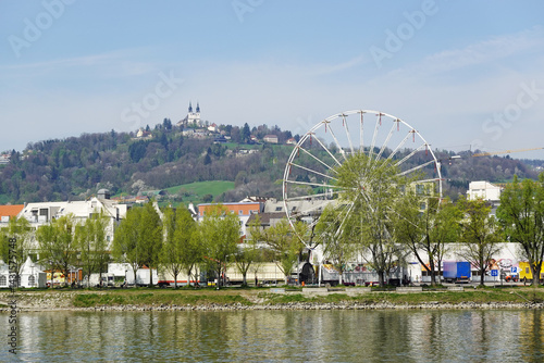 Obraz na płótnie A riverside embankment in Linz, the river Danube, Austria w salonie