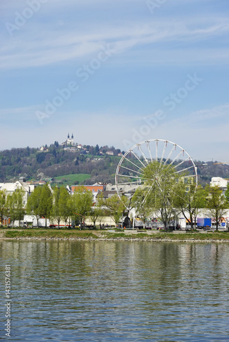 Obraz na płótnie A riverside embankment in Linz, the river Danube, Austria w salonie