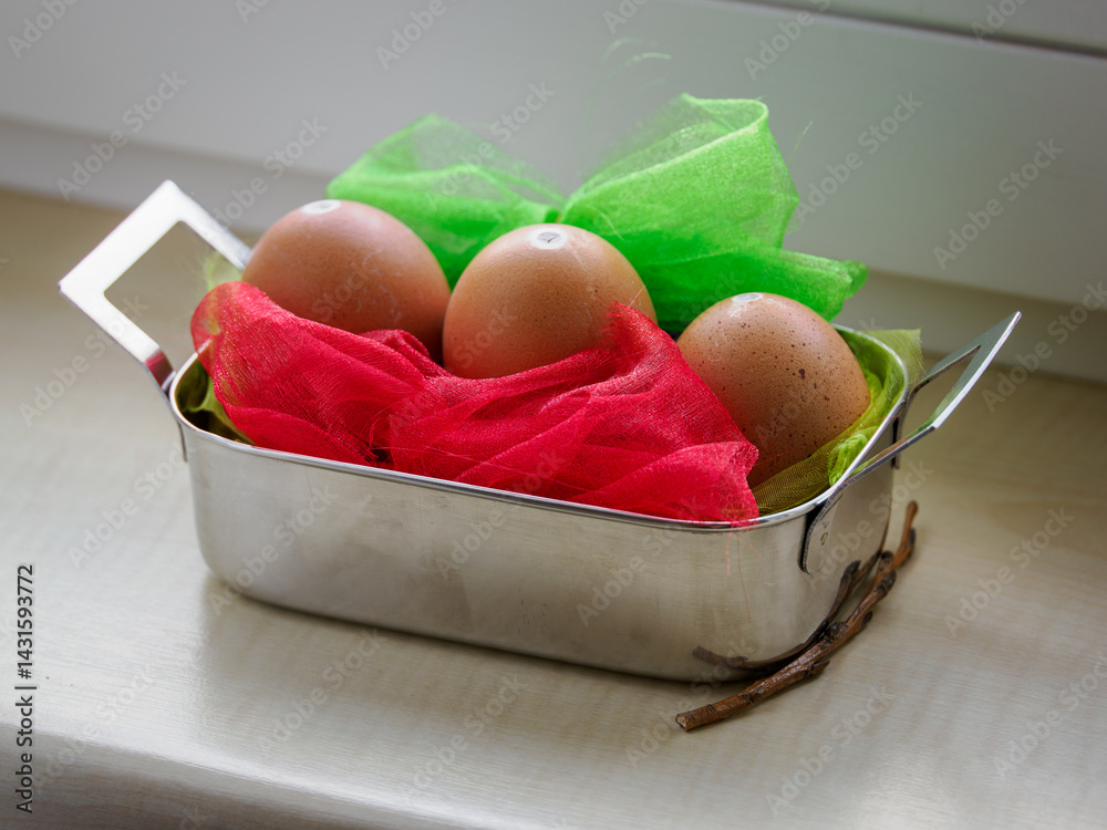 Eggs blown out in a stainless steel tub - drying.