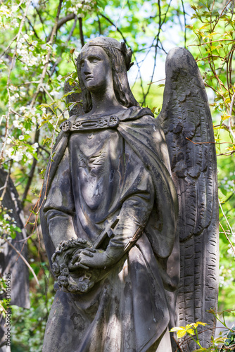 Obraz na płótnie Historic Statue on the spring mystery old Prague Cemetery, Czech Republic w salonie