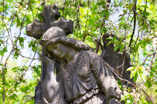 Obraz na płótnie Historic Statue on the spring mystery old Prague Cemetery, Czech Republic w salonie