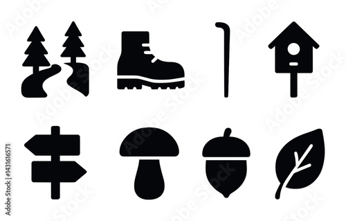 Nature and hiking solid icons set – silhouette style outdoor adventure, camping, and wildlife symbols: forest, boot, walking stick, birdhouse, signpost, mushroom, acorn, leaf.