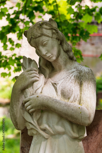 Obraz na płótnie Historic Statue on the spring mystery old Prague Cemetery, Czech Republic w salonie