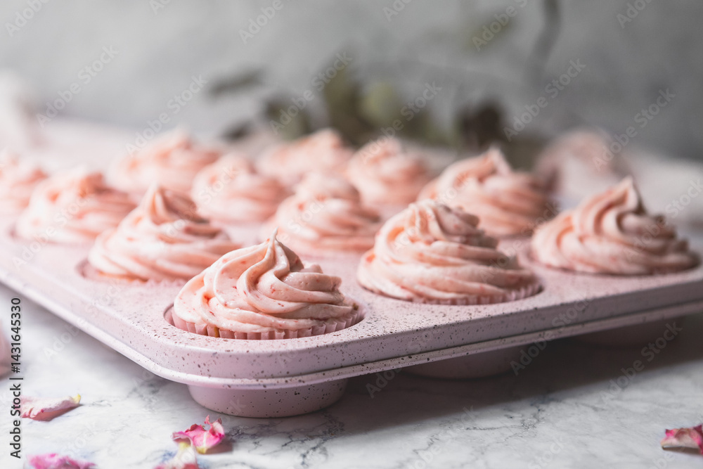 Close up of Pink Strawberry Cupcakes in a Pink Muffin Tin Close up of Pink Strawberry Cupcakes in a Pink Muffin Tin